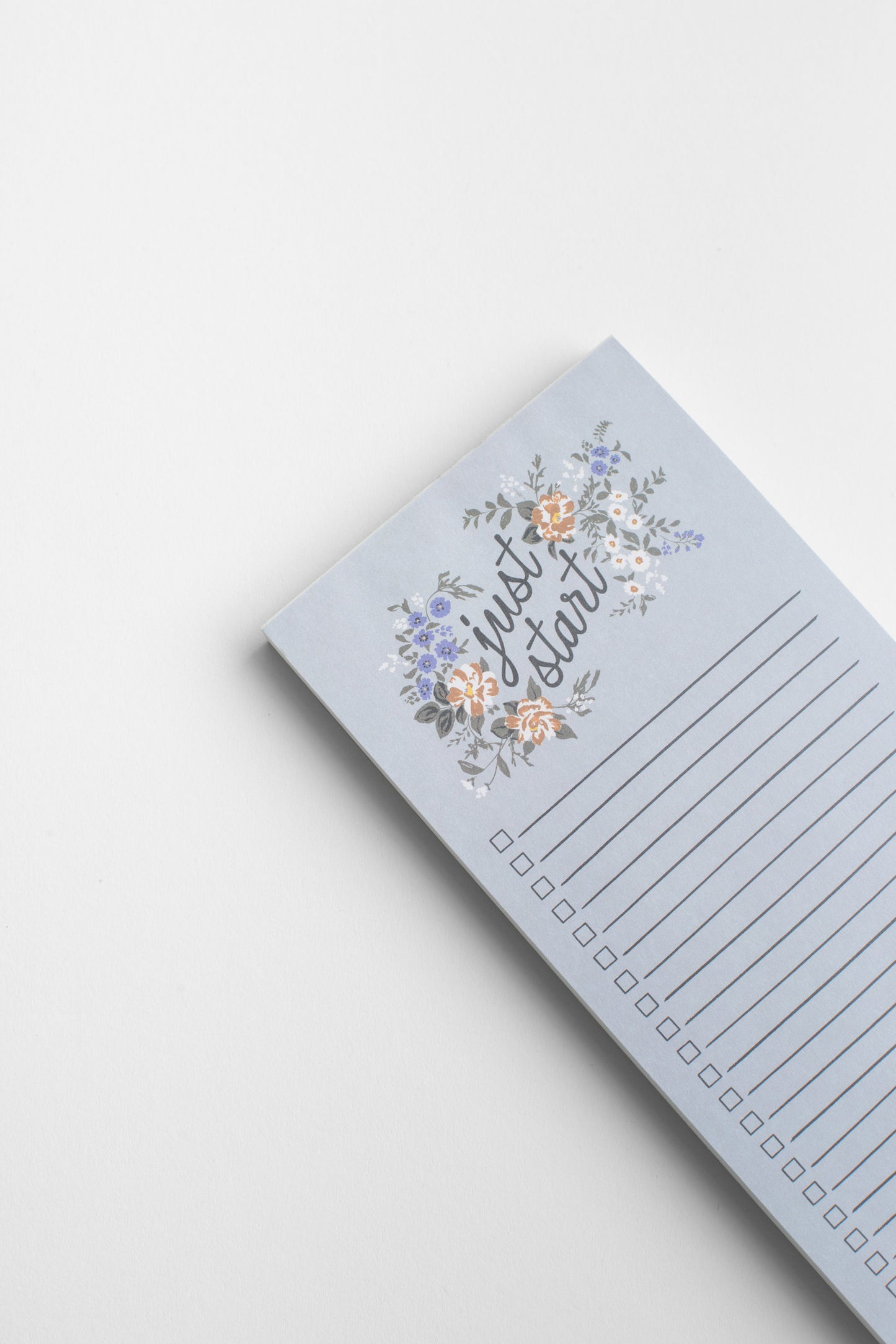 This Blossom List Notepad by Bonnie Christine features hand-drawn floral accents, 75 tear-off sheets, and a gentle ‘just start’ message, perfect for organizing tasks, grocery lists, or daily goals with a touch of beauty.