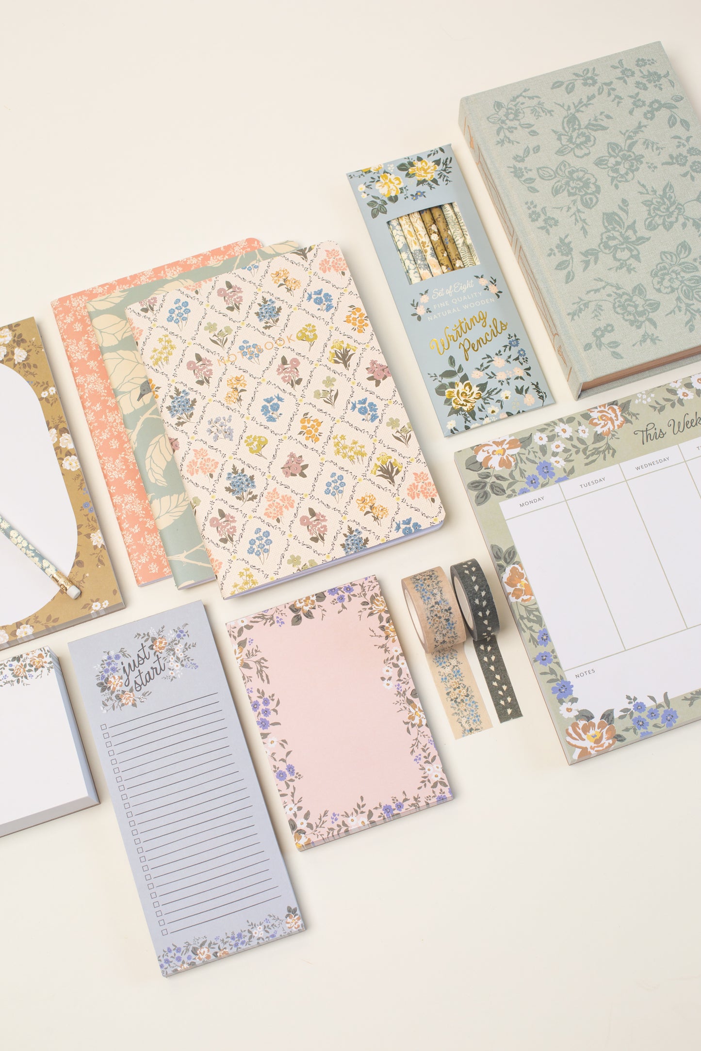 This stationery collection by Bonnie Christine includes the Blossom Mini Note Block, Blossom Small Notepad, Blossom Large Notepad, Blossom Weekly Planner Notepad, Blossom List, Pipet Pencil Set, Reverie Notebook Trio Set, Daydreamers Sketchbook, and Masking Tape-washi tape all adorned with delicate floral designs, perfect for adding beauty to everyday planning, note-taking, and list-making.
