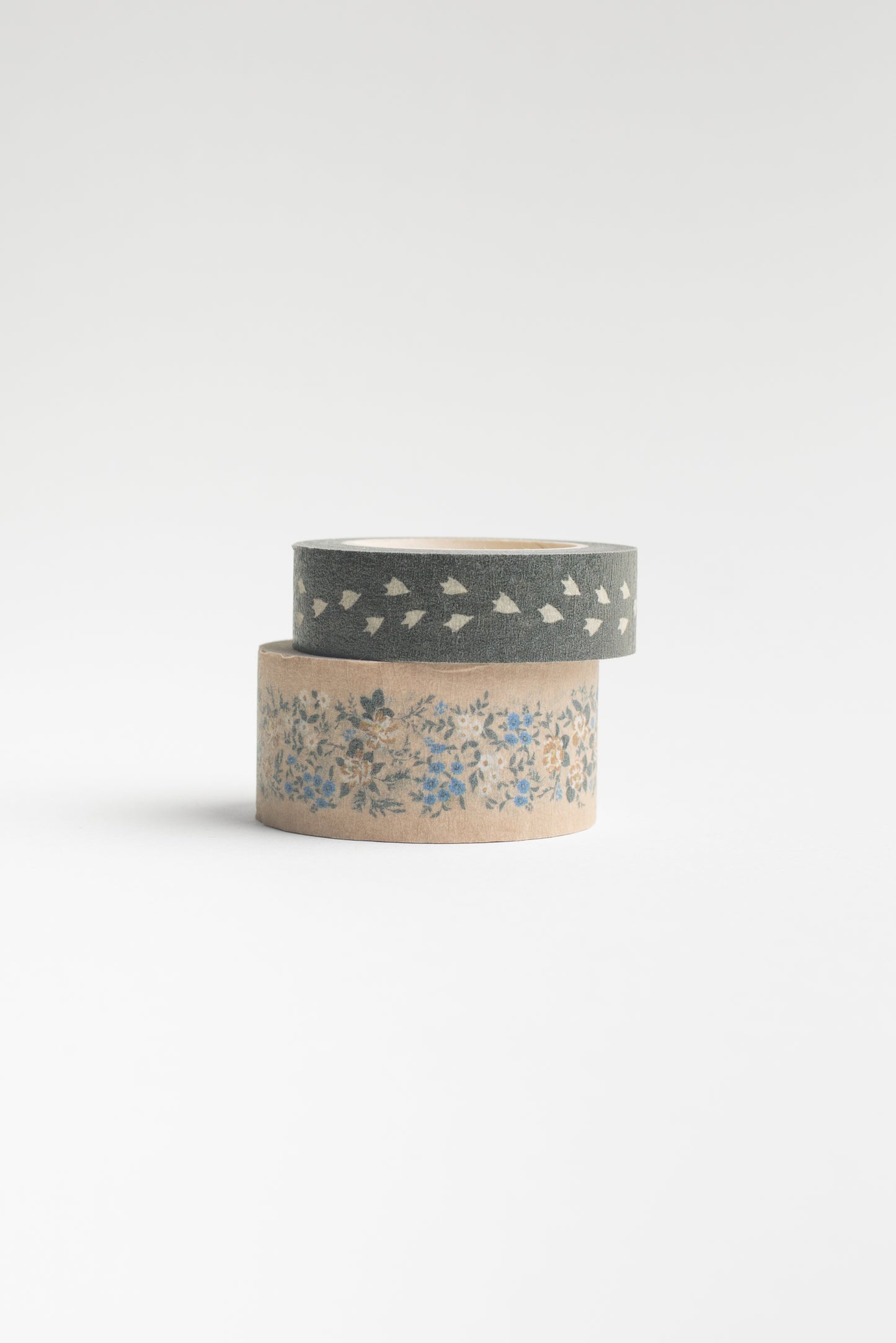 This Mini Masking Tape Set by Bonnie Christine, featuring a delicate floral design and Birdie’s footprints, offers extra-sticky adhesive for wrapping gifts, taping lists, or adding charm to any project with a touch of lovely.