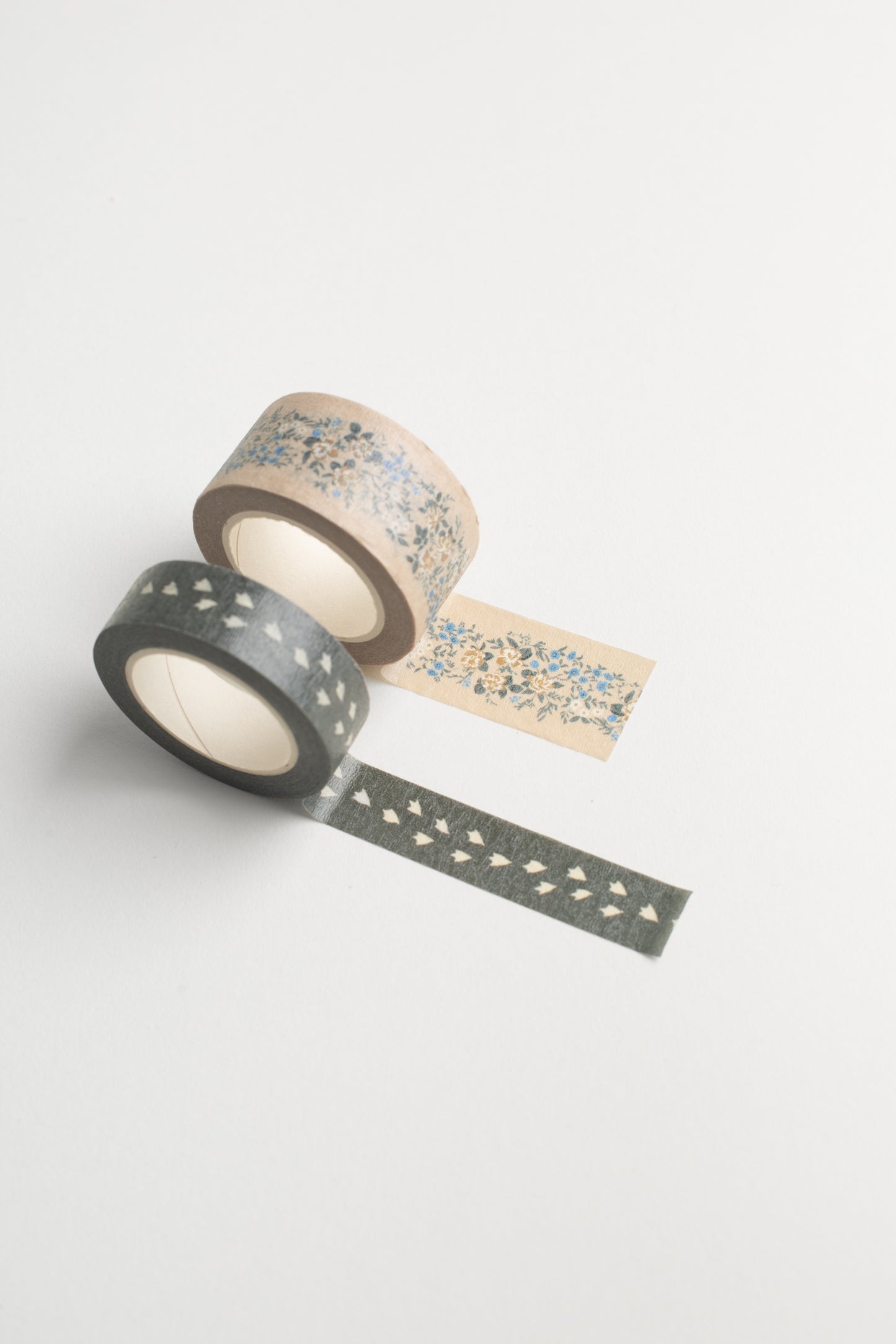 This Mini Masking Tape Set by Bonnie Christine, featuring a delicate floral design and Birdie’s footprints, offers extra-sticky adhesive for wrapping gifts, taping lists, or adding charm to any project with a touch of lovely.