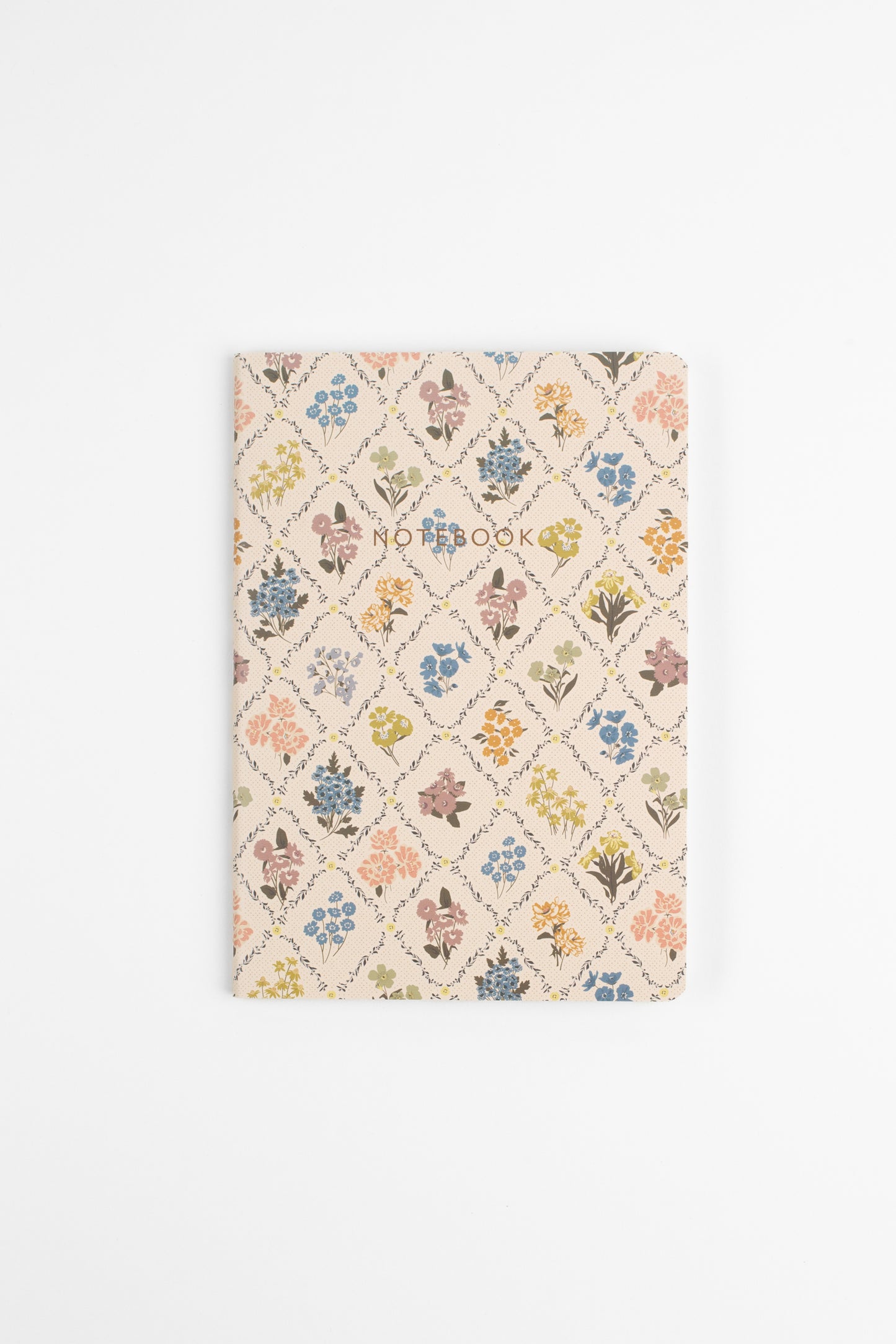 This Reverie Notebook Set by Bonnie Christine includes three softcover journals with delicate floral designs and gold foil accents, perfect for journaling, everyday note-taking, gifting, or brightening a creative workspace.