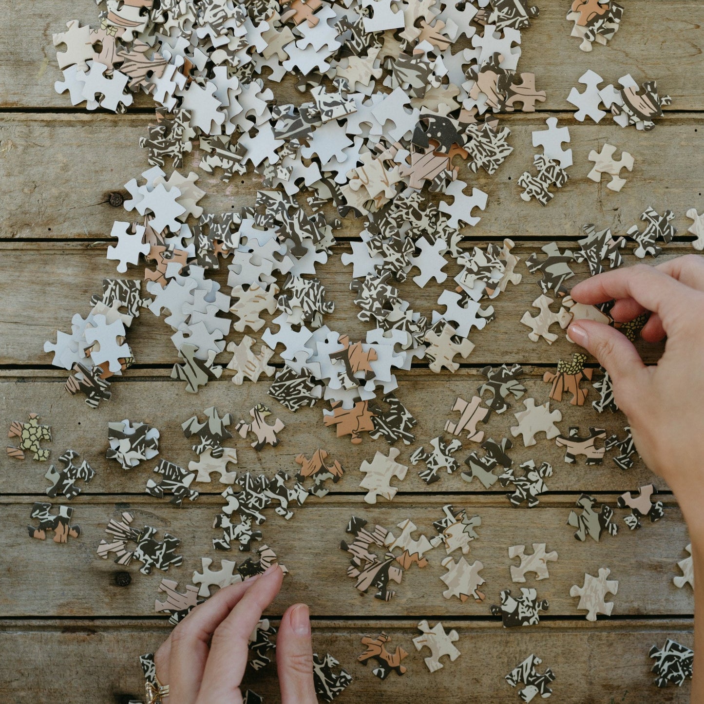 This Woodland Dreams Puzzle by Bonnie Christine features a friendly bear and wildflowers in a charming design, with 1000 pieces packaged in a rigid tube box, perfect for gifting or enjoying quiet cottage-core afternoons.