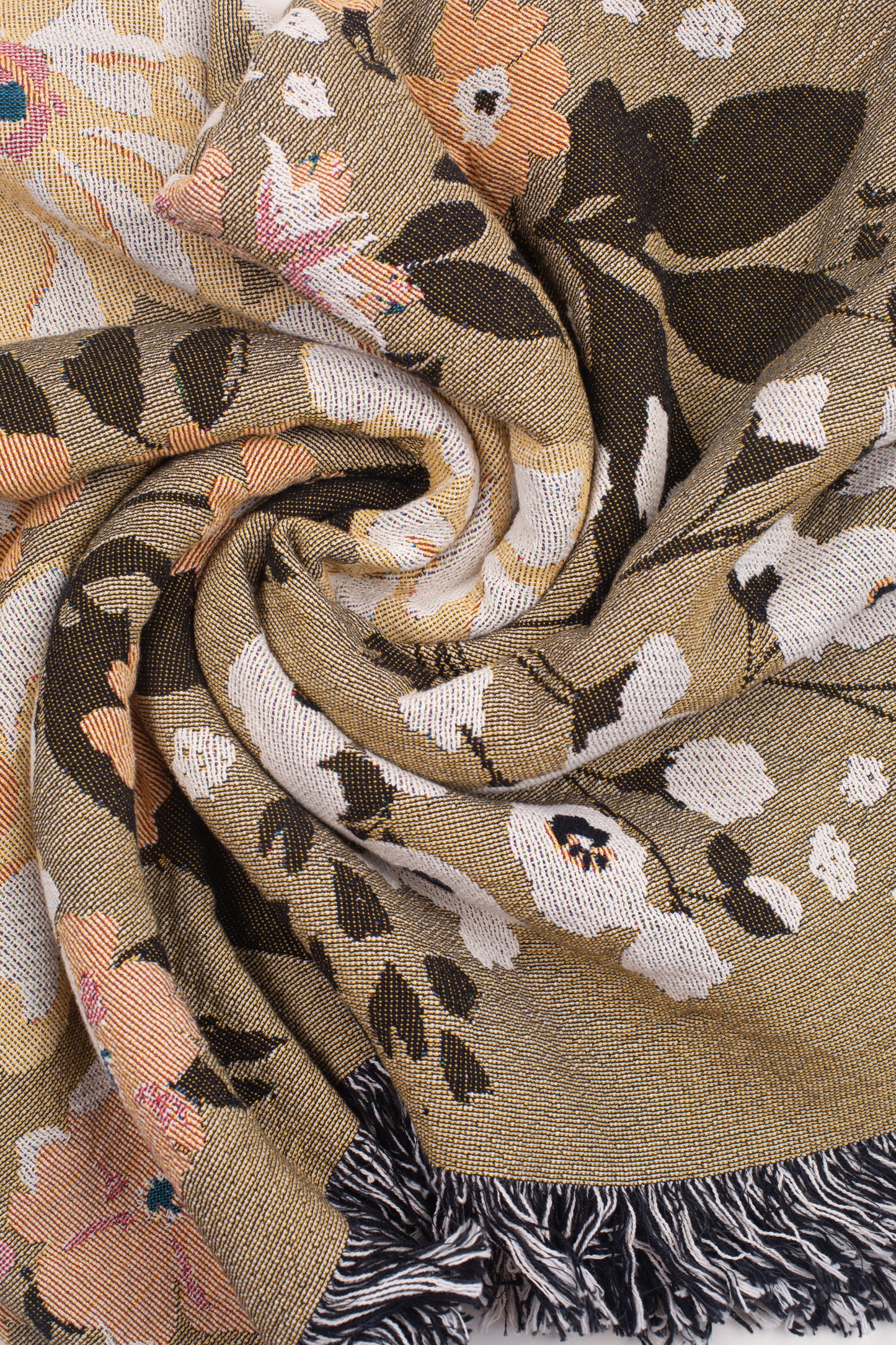 This Cocoon Throw Blanket by Bonnie Christine, woven from 100% Carolina-grown cotton in a floral jacquard tapestry, brings a touch of cottage-core charm to cozy home moments, perfect for gifting, layering, or a garden picnic.