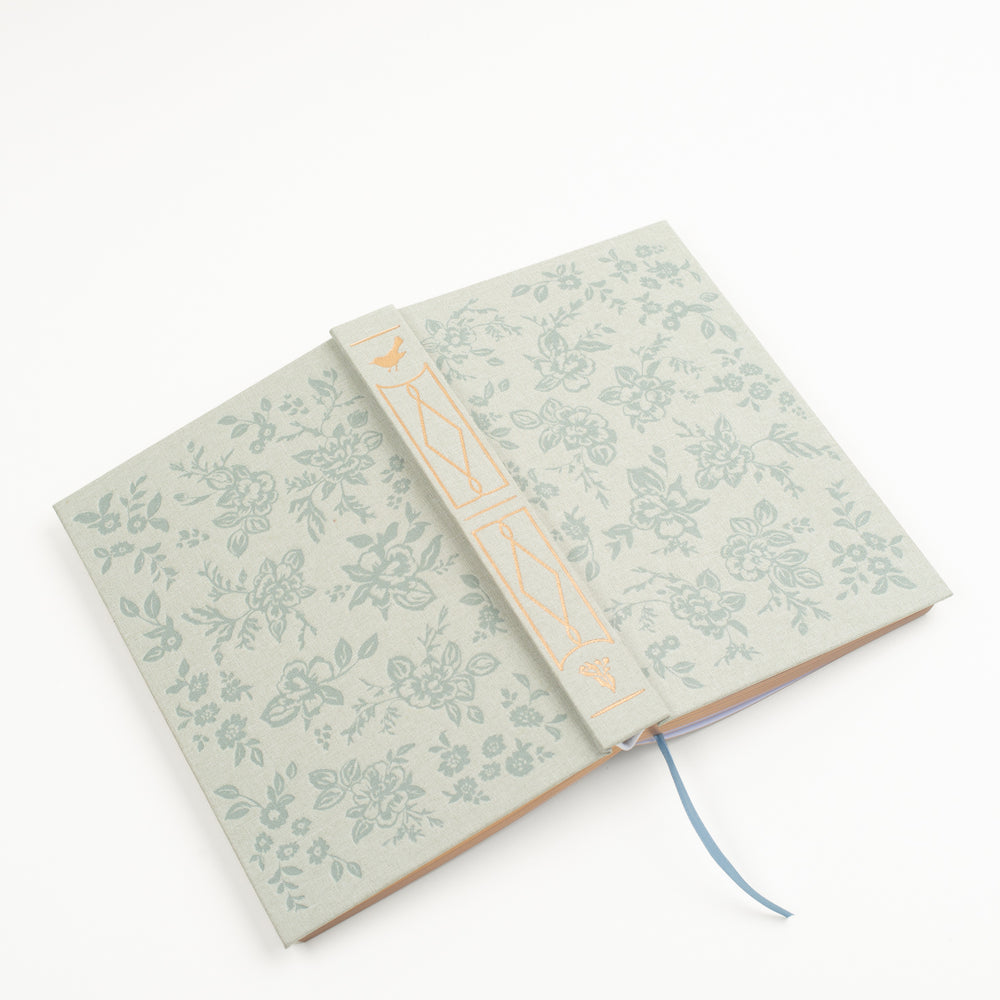 Surface Pattern Designer and Creative Entrepreneur Bonnie Christine introduces the Daydreamer Sketchbook, exclusively designed for Flowerie Shop, featuring a textured linen cover, gold foil spine, and debossed design.